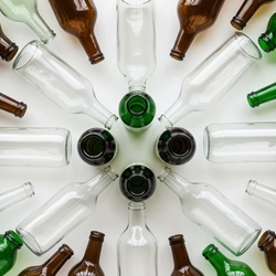Empty bottles arranged artistically in a circle.