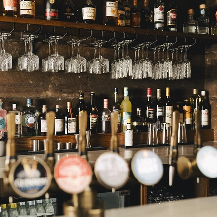 The bar and some bottles behind the bar at the Crown, Penn.