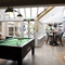 Pool table in interior games area of a pub restaurant