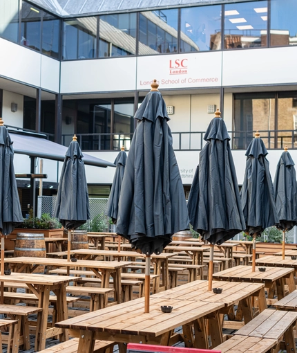 exterior beer garden with seating area