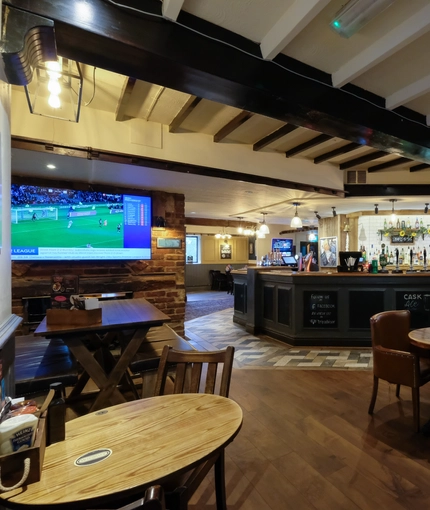 interior of the restaurant with TV
