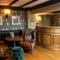 The reception area at Himley House, with two armchairs and a check in desk.