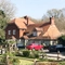 exterior facade and car park of a pub