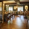 The interior restaurant seating area of The Fox & Hounds in Wimborne.