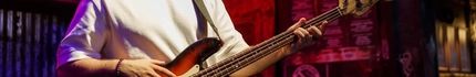 An interior shot of a person playing guitar during the Q3 Live Music Event at one of the Greene King Pubs.