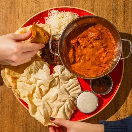 A served main tikka masala platter being enjoyed by customers at Hungry Horse venues.