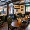 The interior restaurant seating area of Ye Olde Mitre in Barnet.