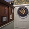 The interior pub games area with dart board at the Tudor Arms.