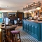 The interior bar and restaurant seating area with feature fireplace at The Yorkshire Grey.