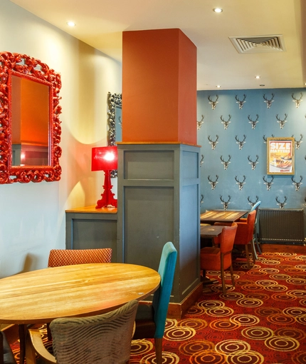 Interior dining area of a pub.