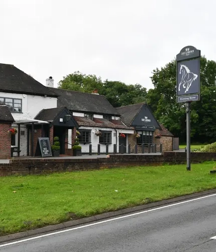 The exterior of The Running Horse Inn