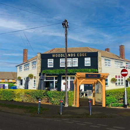 The exterior facade of The Woodlands Edge.