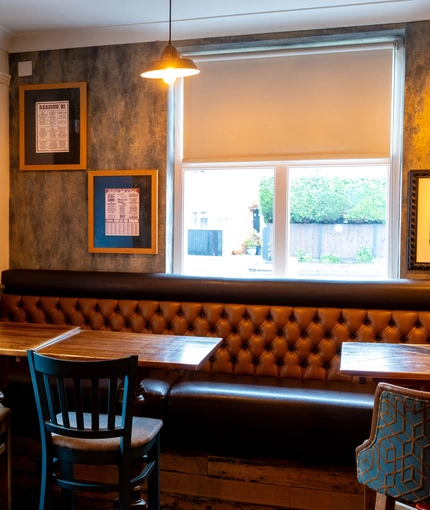 Interior dining area of a pub.