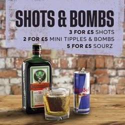 A banner displaying the shots and bombs promotion available at Flaming Grill venues.