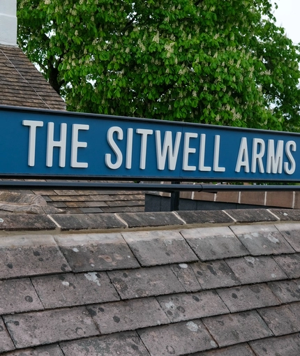 An exterior shot of signage at the Sitwell Arms in Whiston.