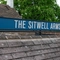 An exterior shot of signage at the Sitwell Arms in Whiston.