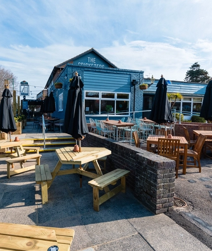 Exterior and beer garden of the Cricketers pub in Southwick