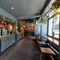 Interior restaurant and seating area with bar