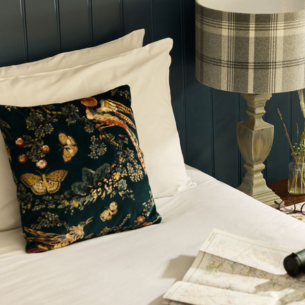The bed of a hotel room in a Chef & Brewer Pubs With Rooms.