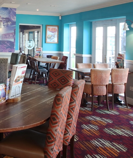 Interior dining area of a pub.