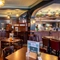 The interior restaurant and seating area with bar and TV at the Fitzrovia.