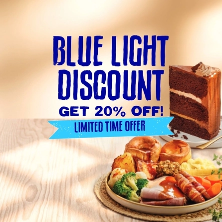 A banner featuring the words "Blue Light Discount, Get 20% Off! Limited Time Offer", on an image of a plate of roast dinner and a plate of chocolate cake, sitting on a wooden table.
