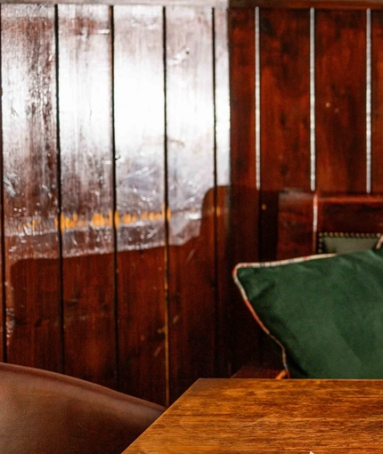 The interior restaurant seating area of Ye Olde Mitre in Barnet.