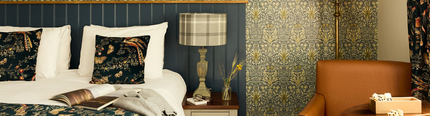 Hotel room with an image of the bed cut off.