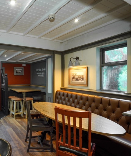 Interior dining area of a pub.