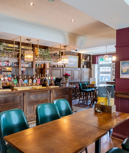 interior bar with restaurant and seating area