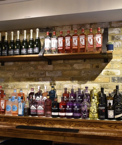 Spirits bottles behind bar