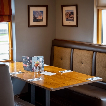 One of the interior tables within the restaurant seating area at The Wellington Hotel.