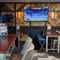 The interior restaurant and dining area with TV at the Lutley Oak.