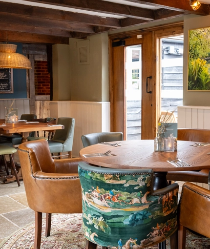 The interior restaurant and seating area at the Crown Inn.