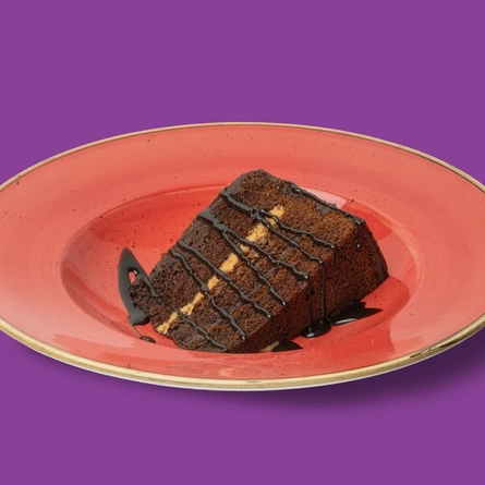 A packshot featuring a bowled Chocolate Fudge Cake dish available for delivery from Hungry Horse venues.