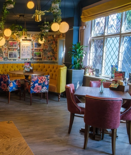 the interior restaurant and seating area at the Tudor Arms.