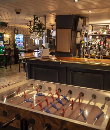 Interior bar area with football game table