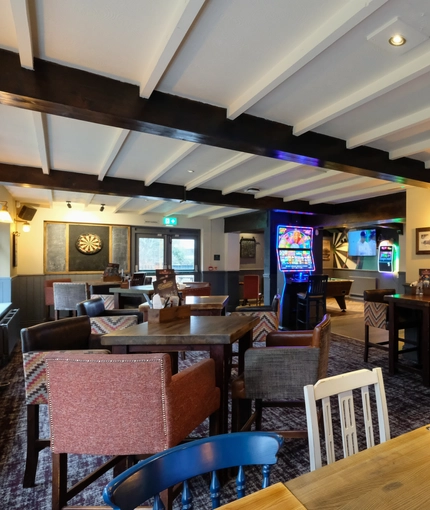 interior of the restaurant with pub games