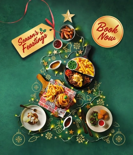 A flat lay of Flaming Grill food in the shape of a Christmas tree.