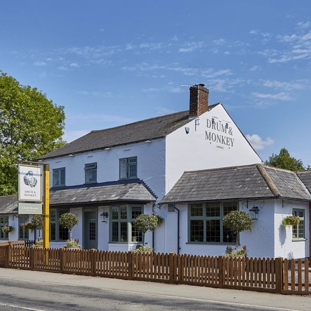 The exterior facade of The Drum and Monkey.