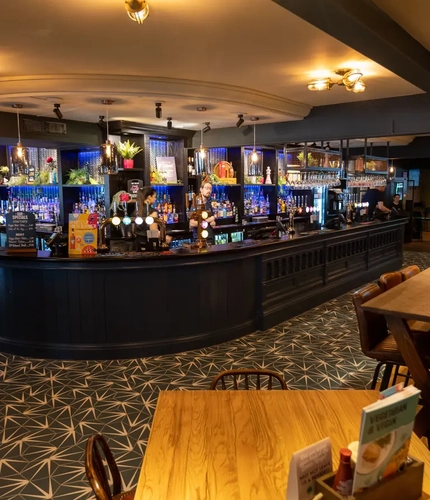 interior bar with seating area and restaurant