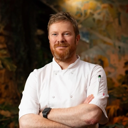 An interior portrait of a staff member at the Ubiquitous Chip in Glasgow.
