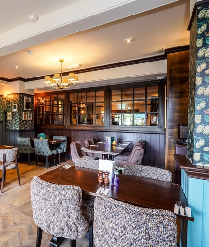 The interior restaurant seating area at The Two Greens.