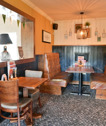 Interior dining area of a pub.