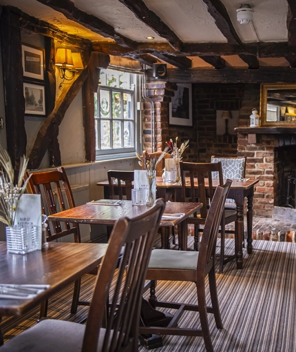 A fireplace within the restaurant area of The Boars Head.