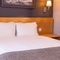 The interior hotel double bed bedroom at the Brentwood.