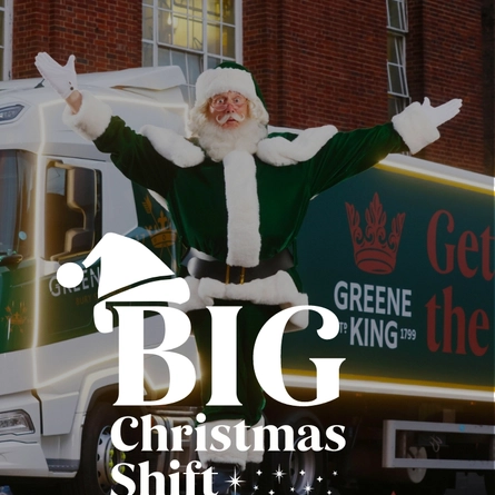 A banner showing the words "Big Christmas Shift" on top of an image of Santa Claus standing in front of a  Greene King truck with both of his arms raised up.