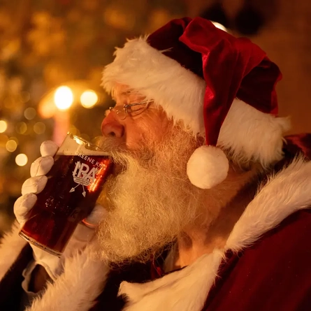Santa drinking a Greene King IPA