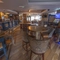 interior restaurant and seating area with pub games