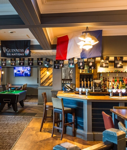 interior of the restaurant with pub games